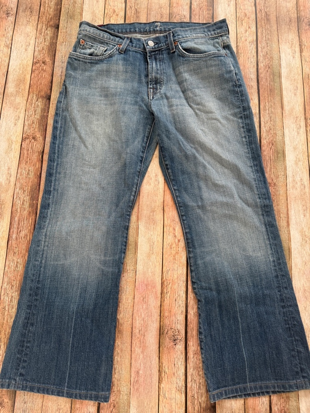 7 For All Mankind faded blue bootcut denim jeans with brown stitching size 32